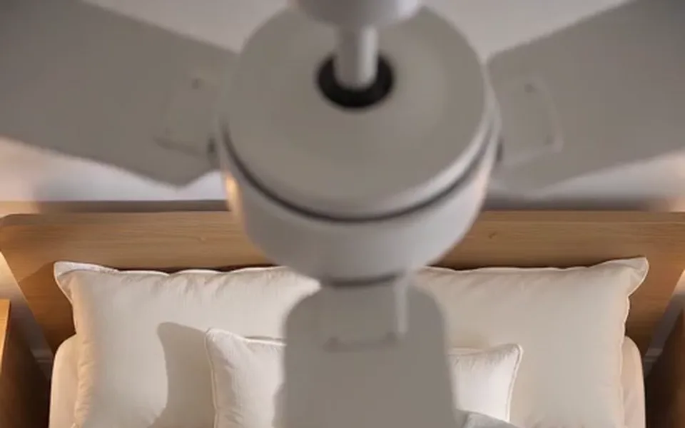 Frame from our demo: the white ceiling fan seen from just below.